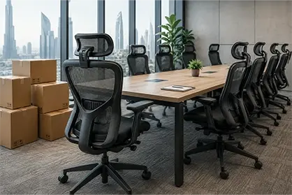 Modern Dubai office with ergonomic chairs arranged around a conference table.